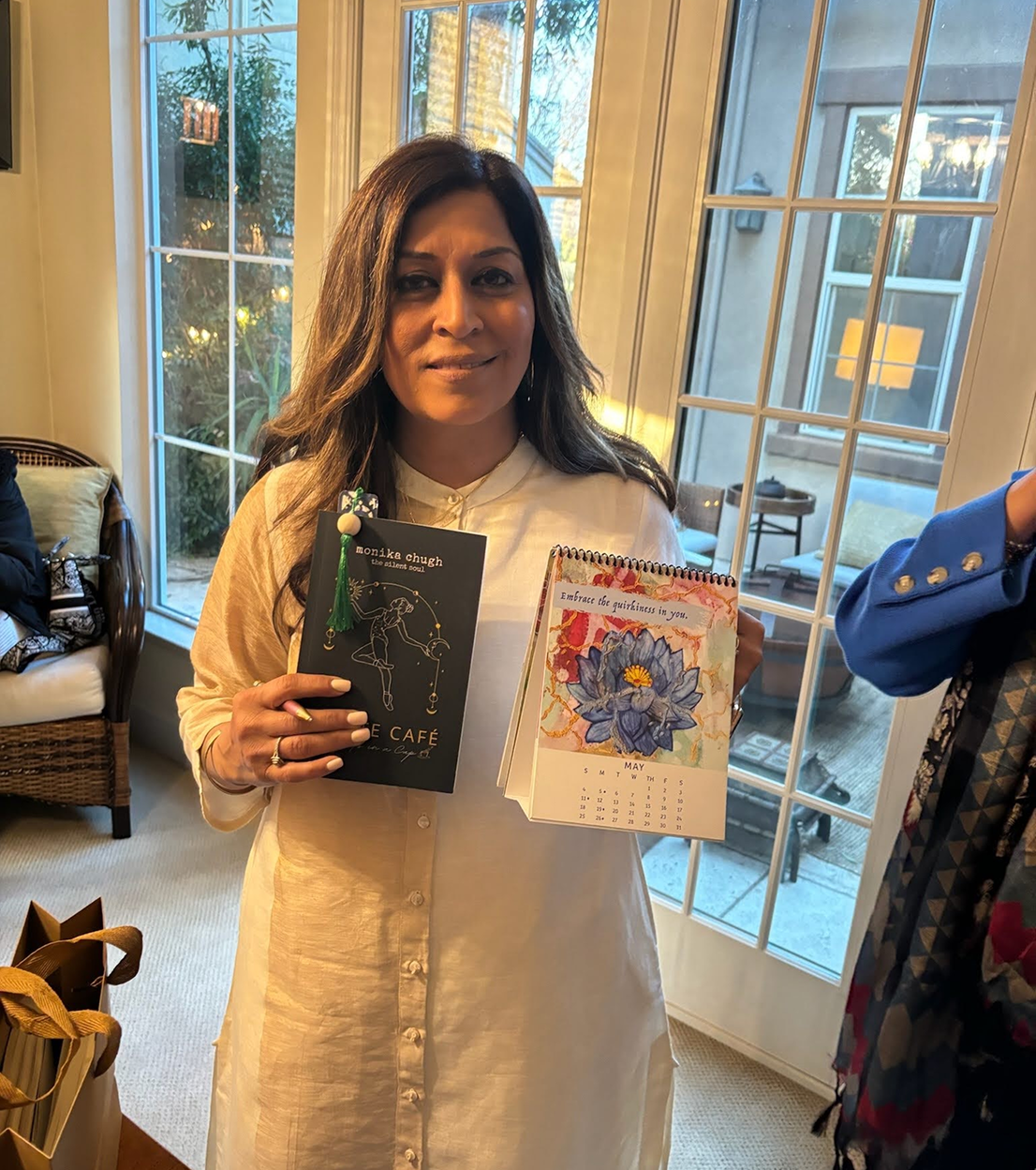 Monika Chugh holding books